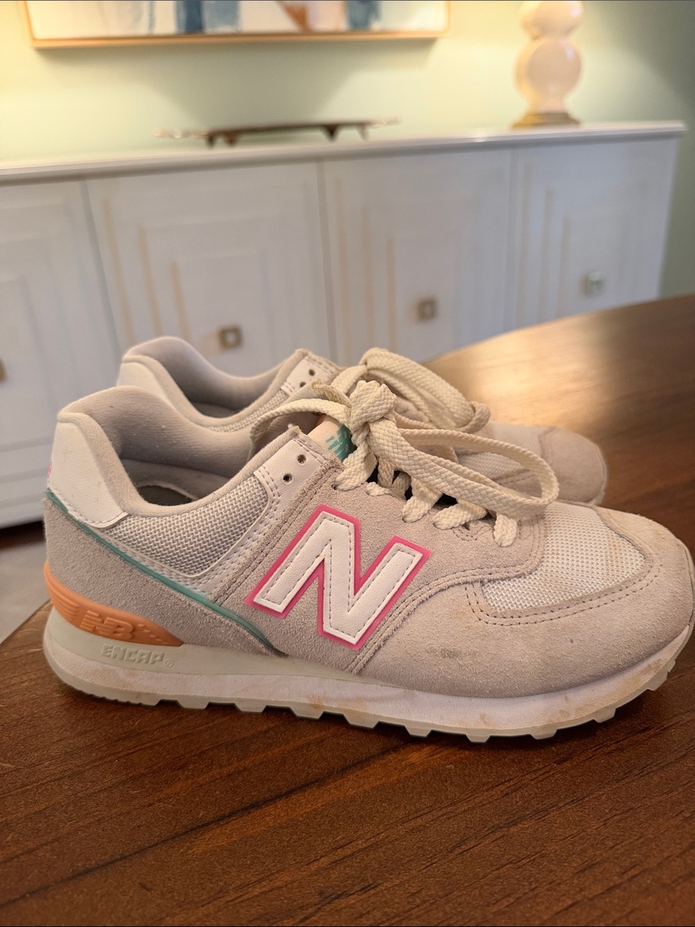 New Balance Light Gray Sneakers with Pink Logo and Teal Trim